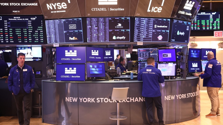 Traders work on the floor of the New York Stock Exchange during morning trading. Michael M. Santiago/Getty Images/AFP