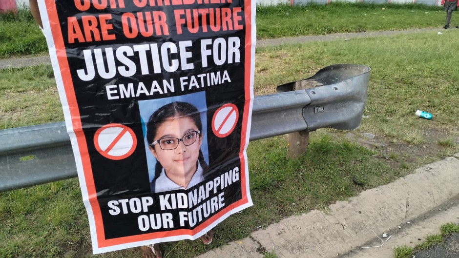 A poster calling for justice for Emaan Ghumman. eNCA/Ronald Masinda