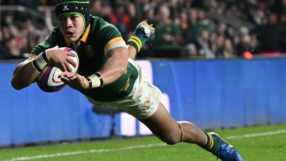 South Africa's wing Cheslin Kolbe scores a try. AFP/Justin Tallis