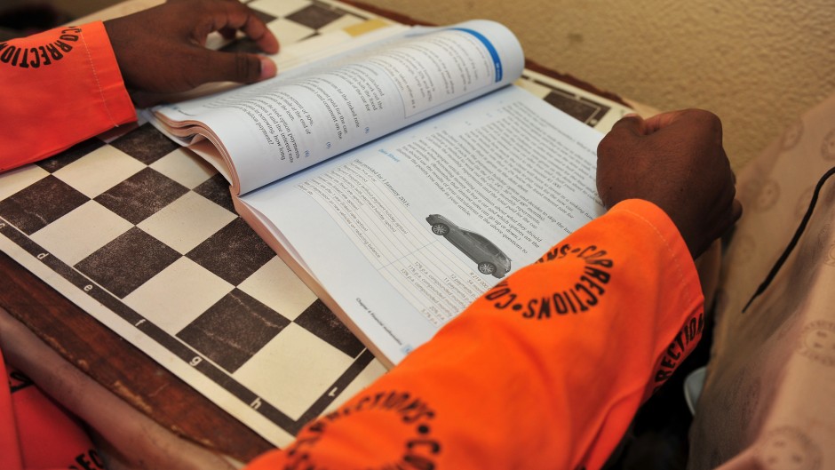 File: A prisoner busy studying. GettyImages/Nigel Jared