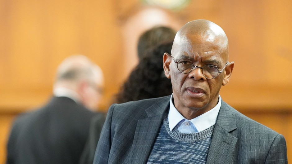 Ace Magashule looks on inside the High Court in Bloemfontein. AFP/Lihlumelo Toyana