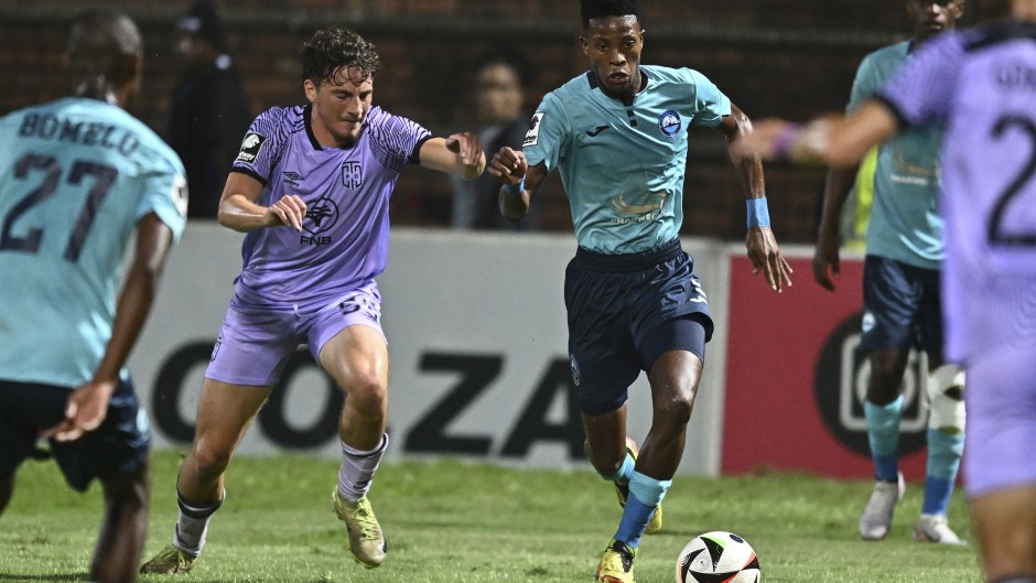 Gabriel Amato of Cape Town City FC challenges Tlakusani Mthethwa of Richiards Bay FC. BackpagePix/Gerhard Duraan