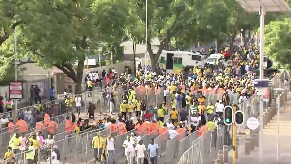 Soccer fans enter the Loftus Versveld grounds
