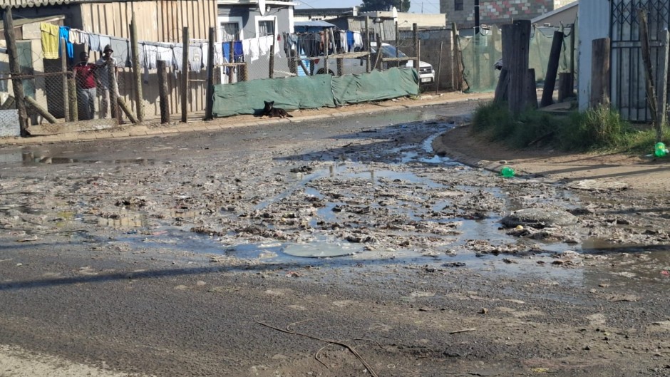 Roads in the small town are covered in raw sewage. eNCA/Nobesuthu Hejana