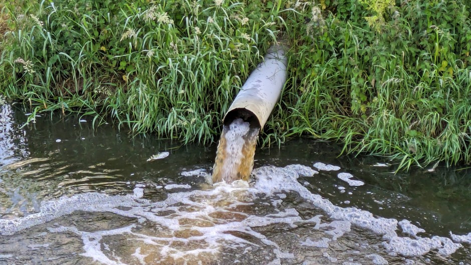 Sewage outflow into a river. GettyImages/Antony Robinson