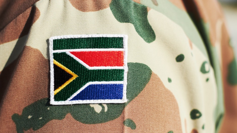 A closeup shot of a South African flag on a soldier's uniform. GettyImages/PeopleImages