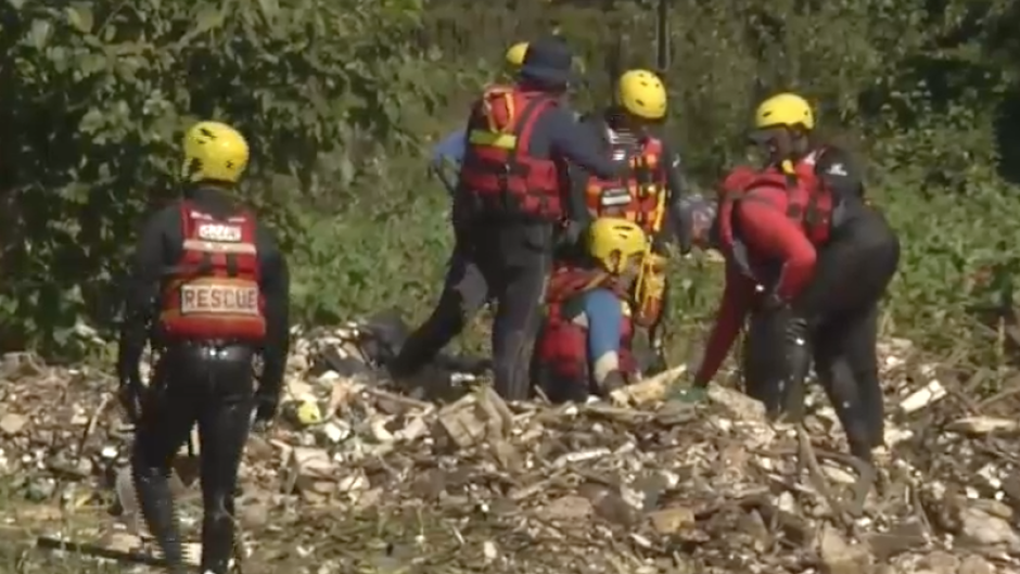 Police divers on the scene at Hennops River.