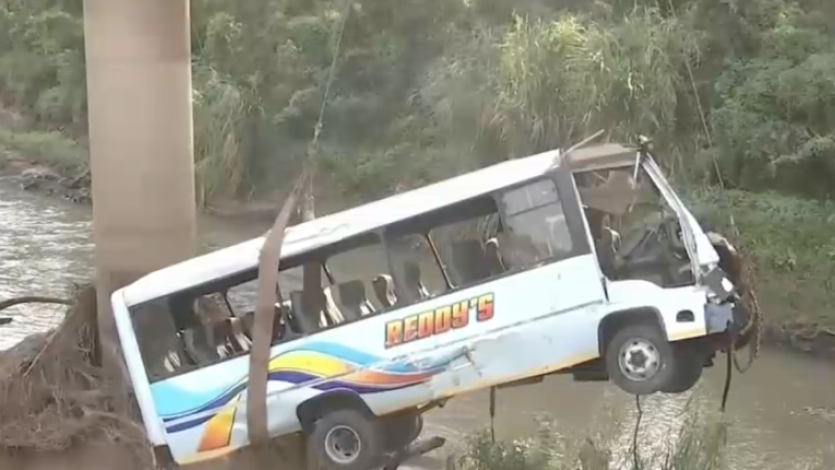 The bus being removed from the scene.