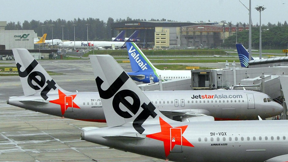 Jetstar Asia and Valuair berthed at Singapore Changi Airport in Singapore. AFP/Roslan Rahman