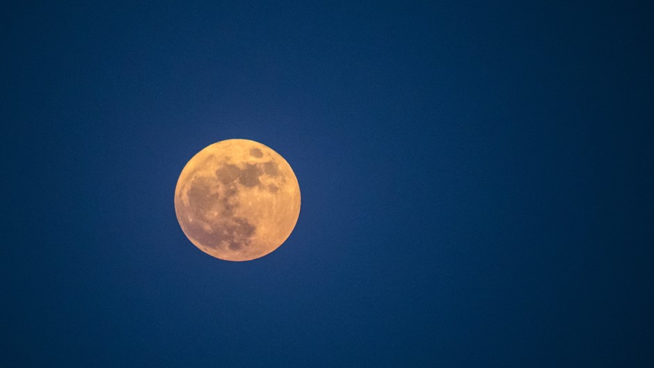 The full Strawberry moon. AFP/Khaled Desouki