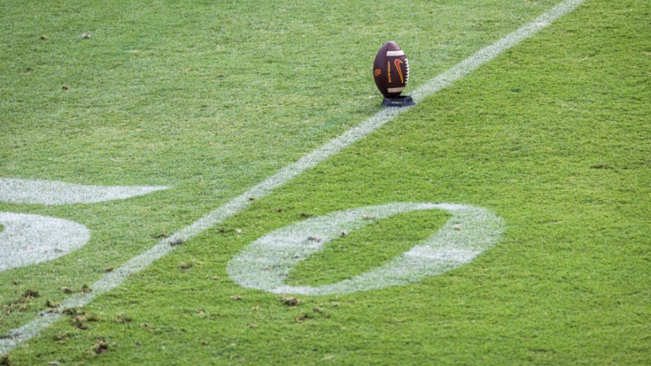 A football sits on a kicking tee. GettyImages/David Madison