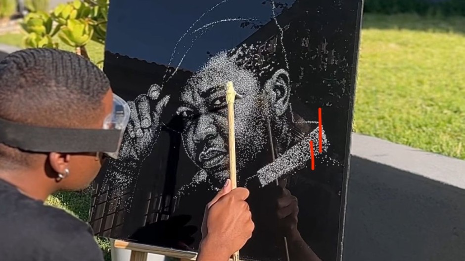 Sandile Kgaphola also known as SK Original with his art piece of Presley Chweneyagae.