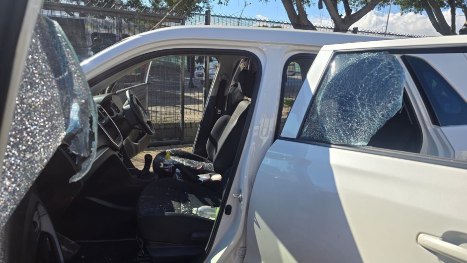  Shattered window of a vehicle Ian Cameron, Nicholas Gotsell and Lisa Schickerling were travelling in when they were attacked in Philippi, Western Cape