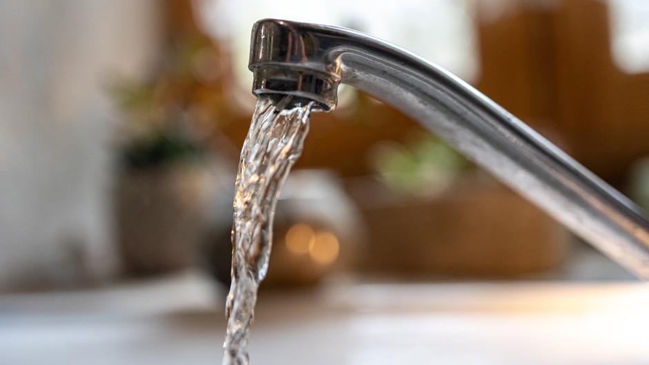 File: Water flowing from a kitchen tap. Isabelle Souriment/Hans Lucas via AFP