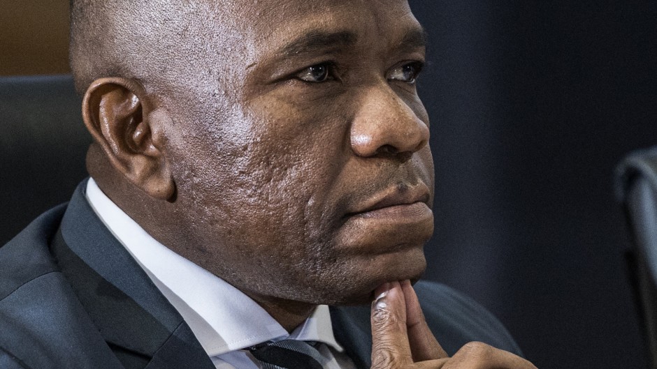 South African Provincial Police Commissioner Nhlanhla Mkhwanazi gestures while giving testimony during the judicial commission of inquiry. AFP/ Phill Magako