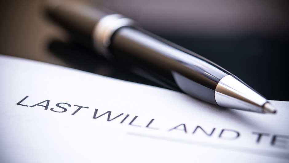 A close-up view of a last will and testament document. GettyImages/MoleQL