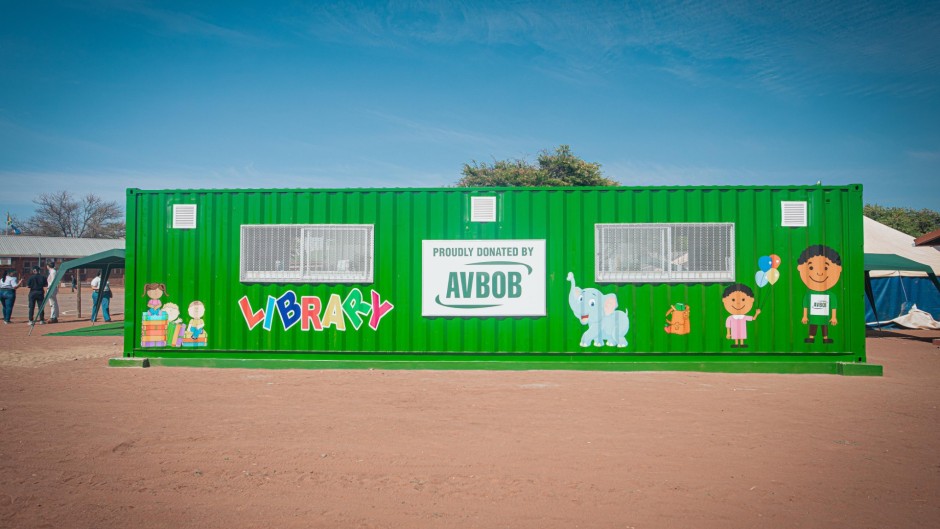 picture of school library at Northern Cape Primary School in Olifantshoek with a sign saying sponsored by AVBOVB