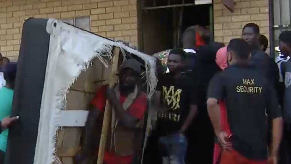 Security removing property from the building.