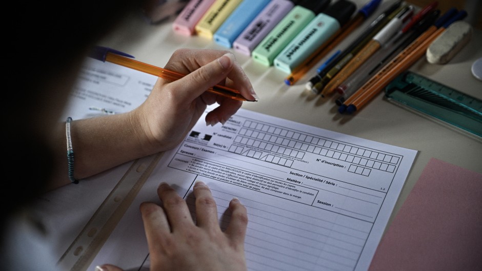 File: A pupil prepares to write an exam. AFP/Julien de Rosa