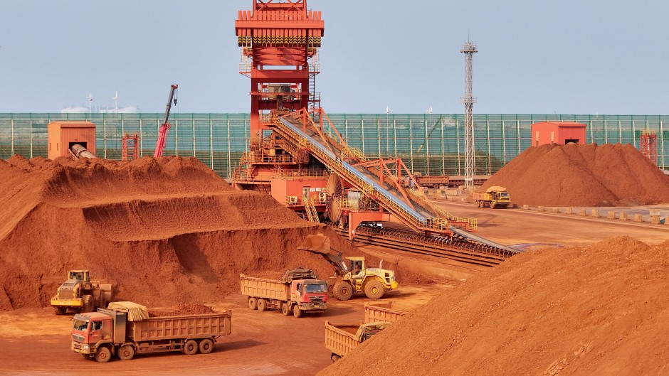 Concentrated bauxite and iron ore. Tang Ke/CFOTO via AFP
