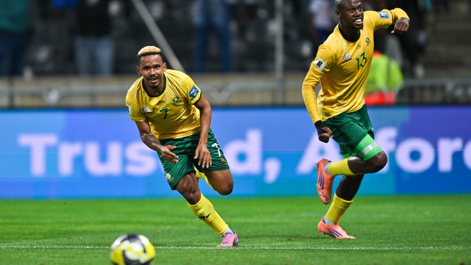 Oswin Appollis and Evidence Makgopa celebrating a goal for Bafana Bafana against Rwanda. 
