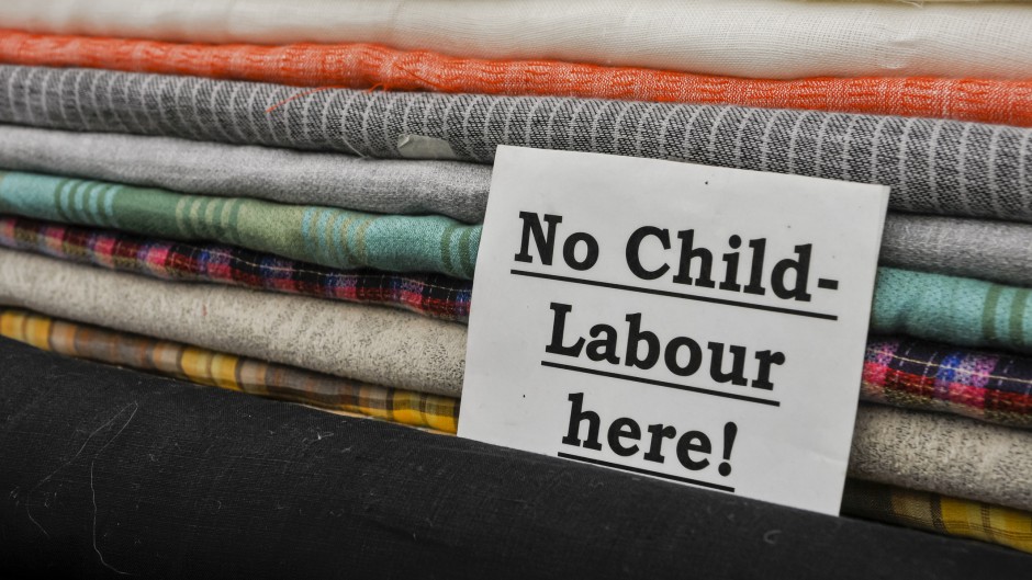 File: Sign advising customers that no child labour is used in the production. GettyImages/Stephen Barnes