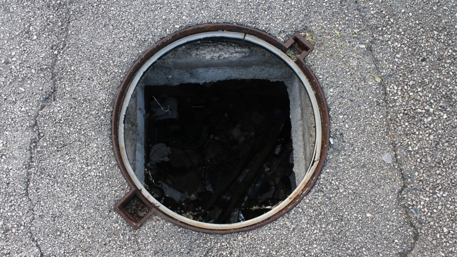 File: An open manhole. GettyImages/Jumbo2010