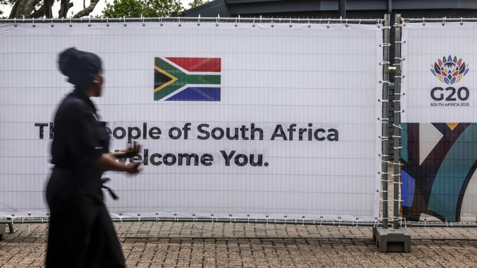 A banner featuring the South African flag and G20 logo at the Nasrec Expo Centre. AFP/Gianluigi Guercia