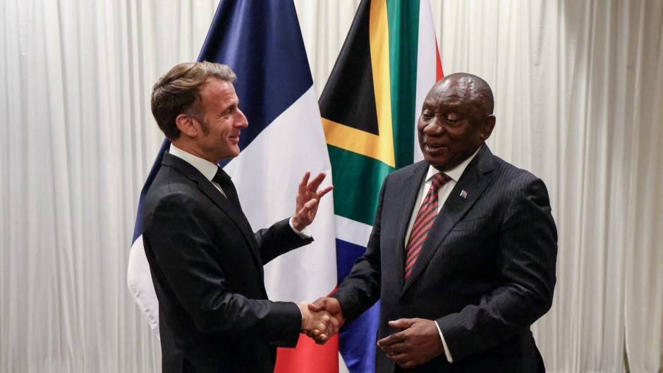 France’s President Emmanuel Macron (L) shakes hands with South Africa's President Cyril Ramaphosa (R) during their bilateral meeting at the Sandton Convention Centre in Sandton on November 21, 2025, ahead of the G20 leaders' Summit. 