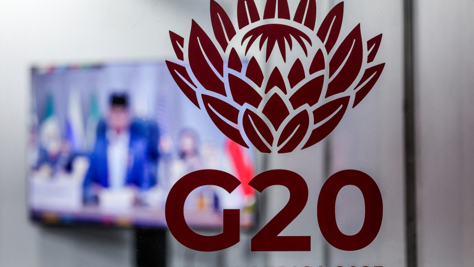G20 logos are displayed at the media centre. AFP/Ludovic Marin