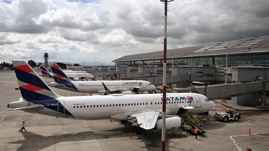 LATAM airline planes are pictured on the tarmac at El Dorado International Airport in Bogota. AFP/Raul Arboleda