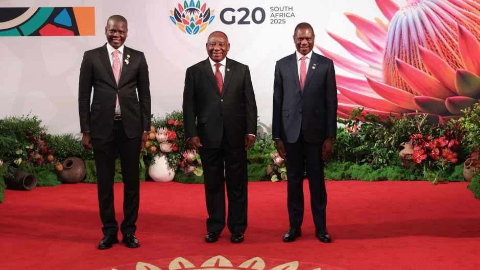 South Africa's G20 World Leaders Summit  Three generations of patriotic South Africans stand together beneath the vibrant King Prote. Photo GCIS