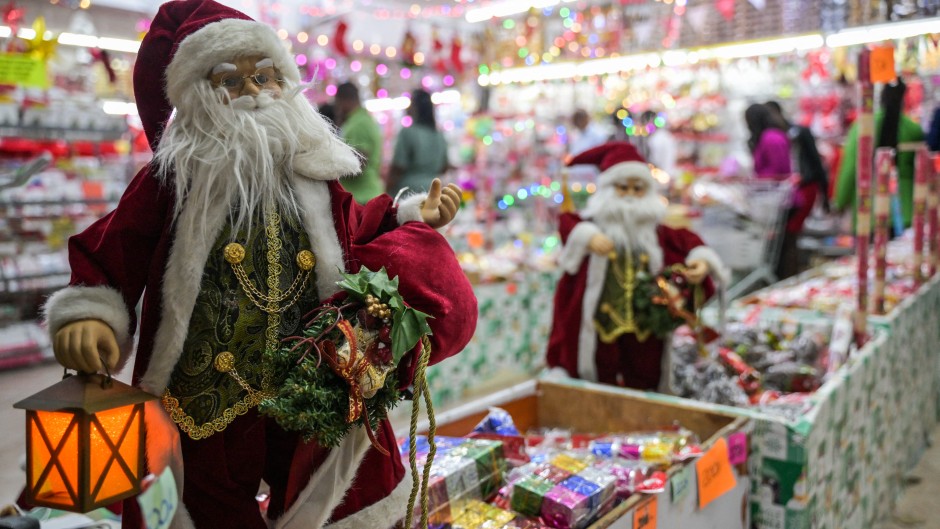 A Santa Clause figurine for Christmas. AFP/Simon Maina