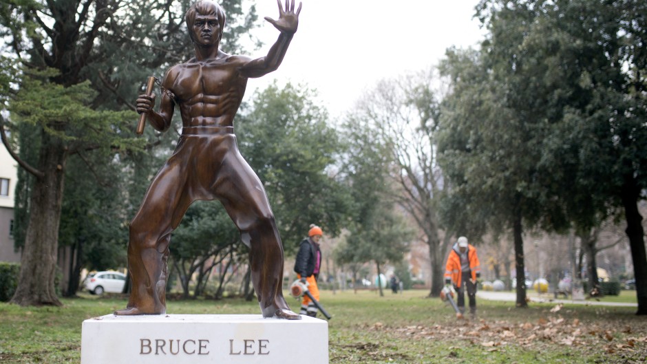 A restored statue honouring late martial arts legend Bruce Lee. AFP/Stringer