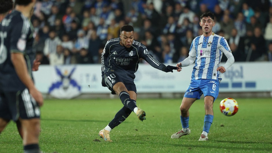 Kylian Mbappe scores his team's third goal during the Spanish Copa del Rey. AFP/Thomas Coex