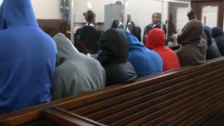 11 officers in the dock