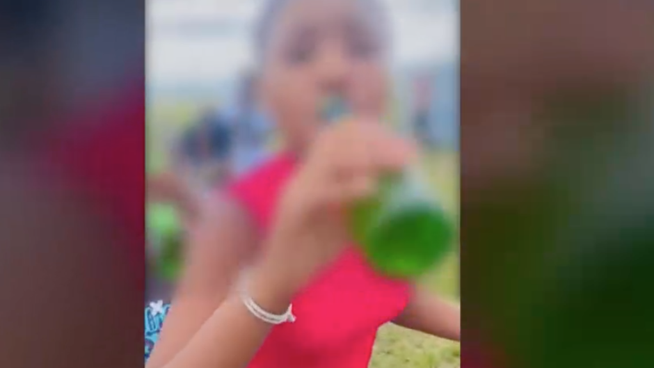 One of the children caught drinking.