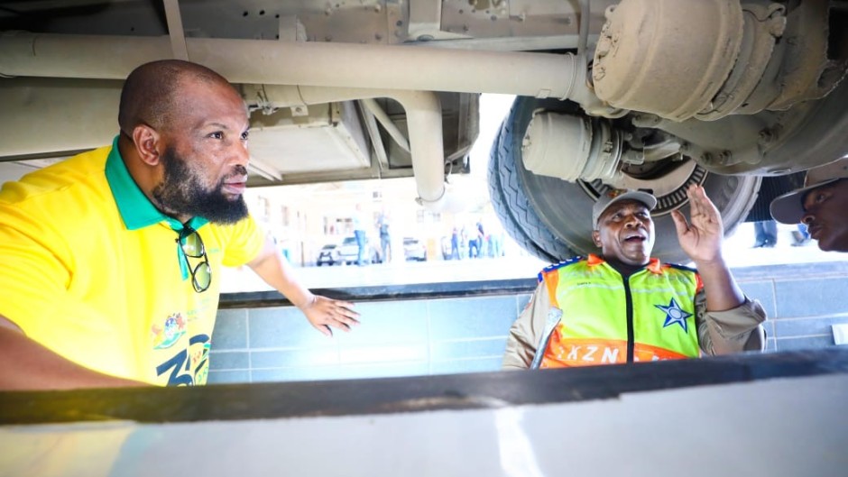 KwaZulu-Natal Department of Transport MEC Sibiniso Duma is seen during an inspection of the scholar transport services fleet.