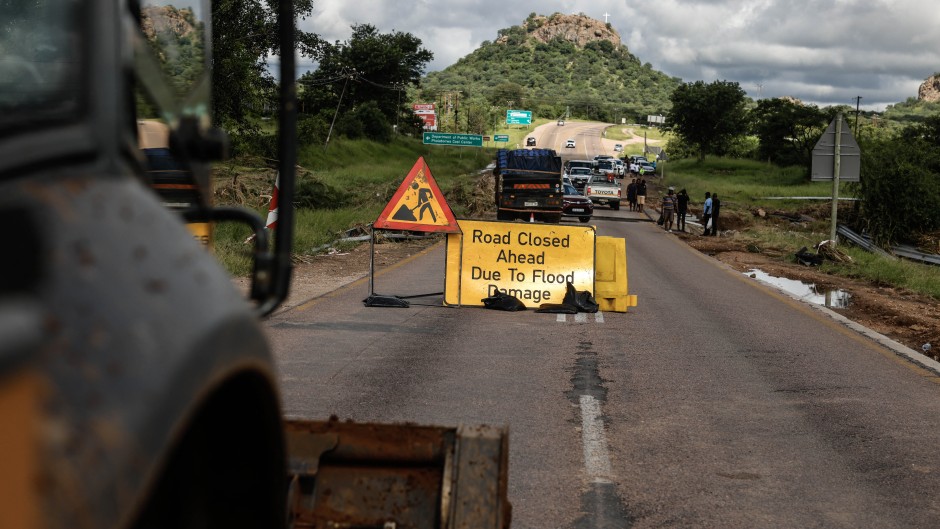 A sign indicating a closed road leading into Phalaborwa following heavy rains over much of Limpopo. AFP/Paul Botes