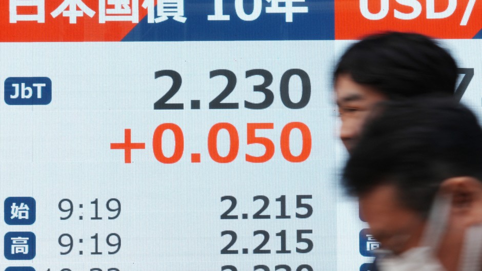 An electronic quotation board displays 10-year government bonds, an index of long-term interest rates on the Tokyo bond market. AFP/Kazuhiro Nogi