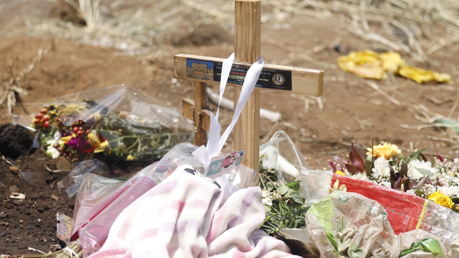 Flowers and candles at a memorial prayer at the scene of the accident that claimed the lives of 14 learners. Gallo Images/Sharon Seretlo
