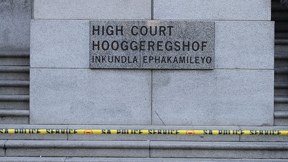 Police tape hangs in front of the Western Cape High Court. Michelly Rall/Getty Images