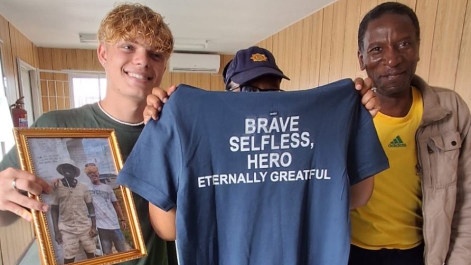 James Smith working with volunteers to resuscitate the patient.