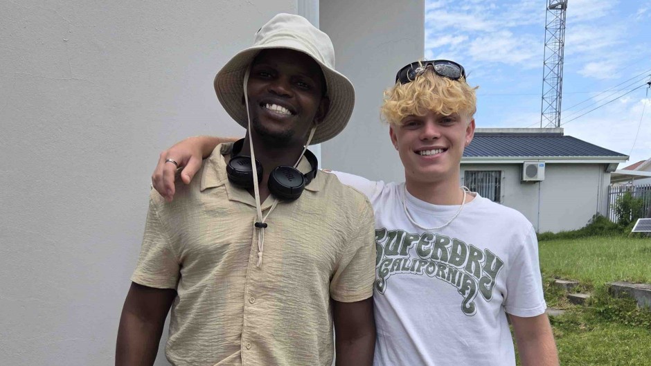 James Smith with Singita, the police officer he saved