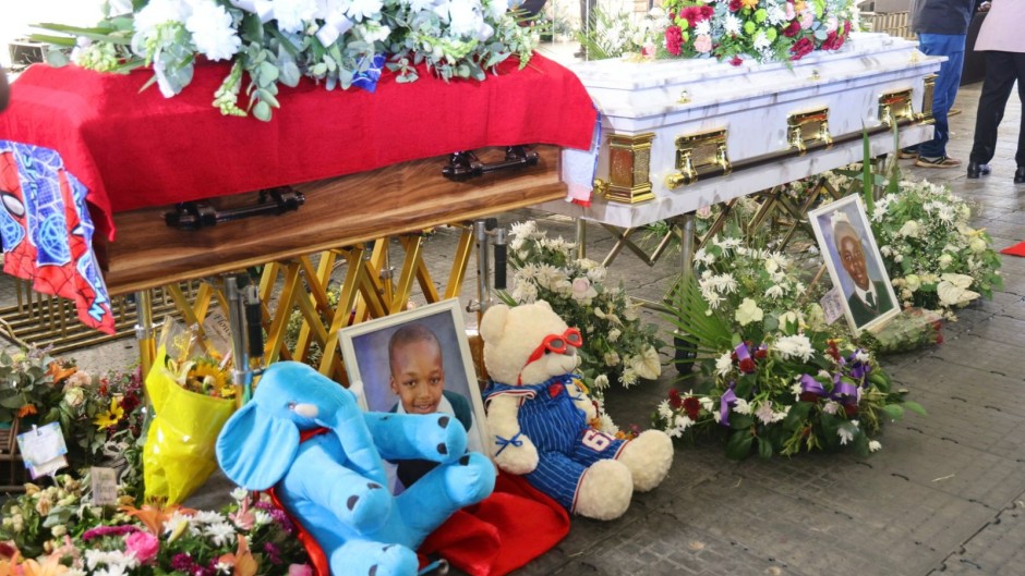 Families were overcome with grief at the funeral. eNCA/Manqoba Mchunu