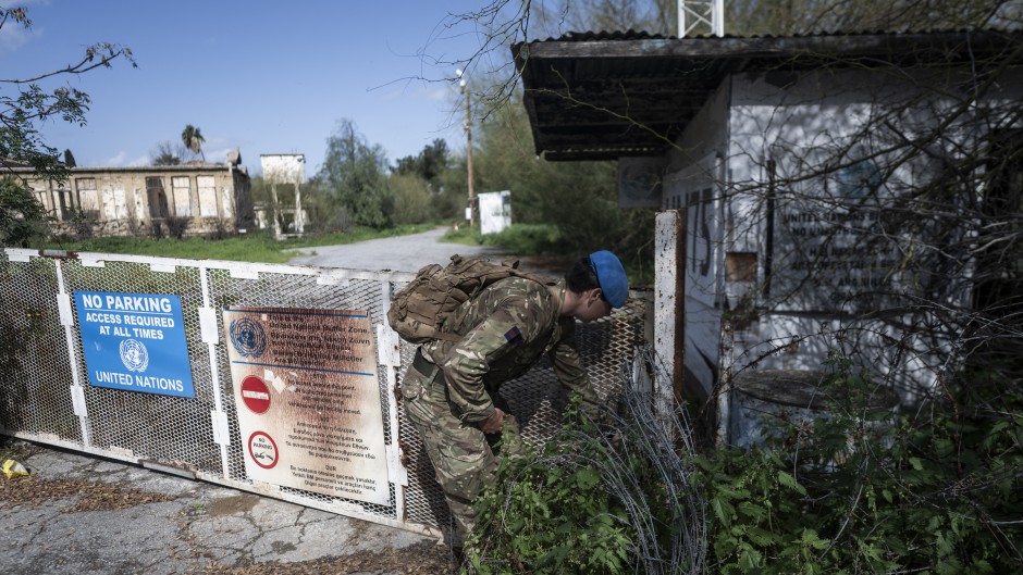The gate to an entrance of the buffer zone separating the internationally recognized Republic of Cyprus and the breakaway Turkish Republic of Northern Cyprus — recognized only by Ankara — in the divided capital Nicosia. AFP/Jewel Samad