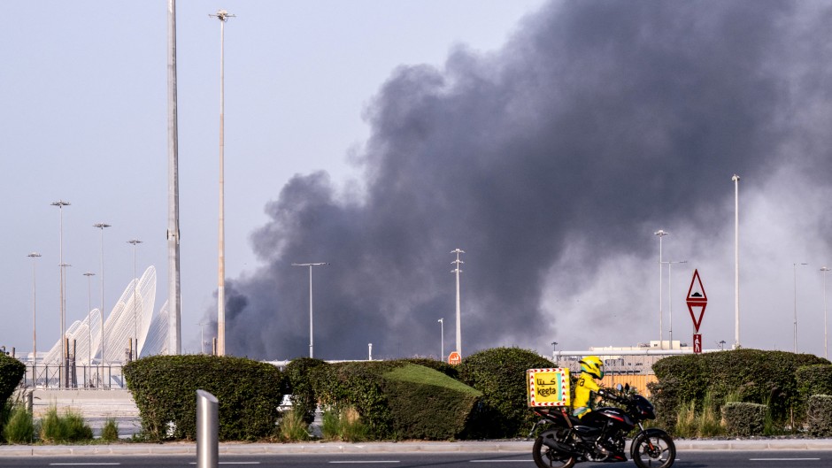A plume of smoke rising from the Zayed Port following a reported Iranian strike in Abu Dhabi. AFP/Ryan Lim