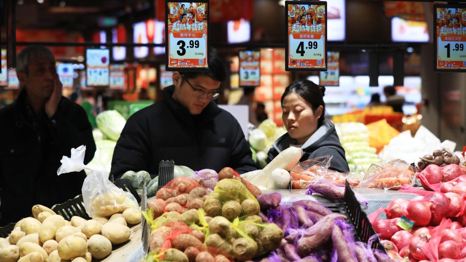 Citizens shop at a supermarket in Huai'an City, east China's Jiangsu Province. Zhou Changguo/IC photo/Imaginechina via AFP