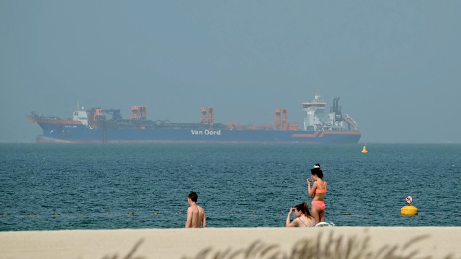 Cargo ships anchored off shore in Dubai. AFP/Giuseppe Cacace