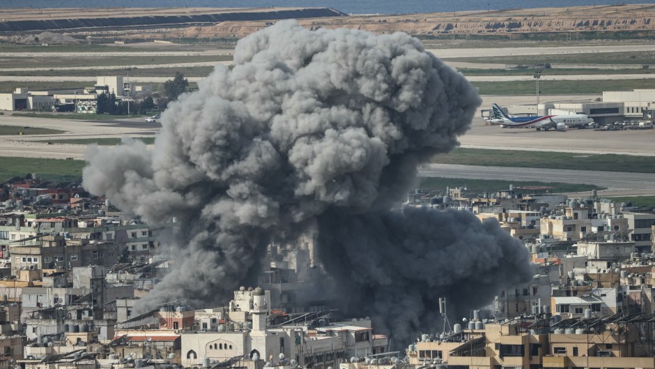 Smoke rises from the site of an Israeli airstrike that targeted the Al Lailaki neighbourhood in Beirut’s southern suburbs. AFP/Ibrahim Amro